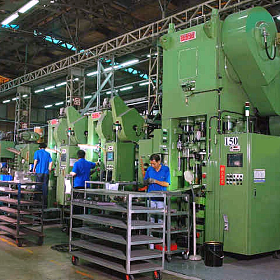 Powder metallurgy shop floor with presses in line